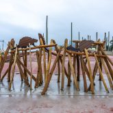 A play structure that looks like a beaver dam