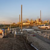 A sunset over a construction site.